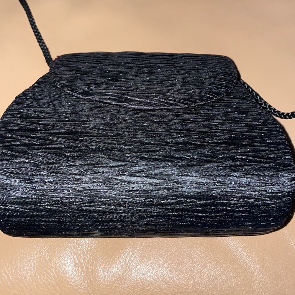 LA REGALE evening bag measures 8x7 w/ 22” strap. bought in boutique shop.